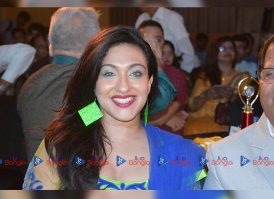 Why was Rituparna in Singapore?