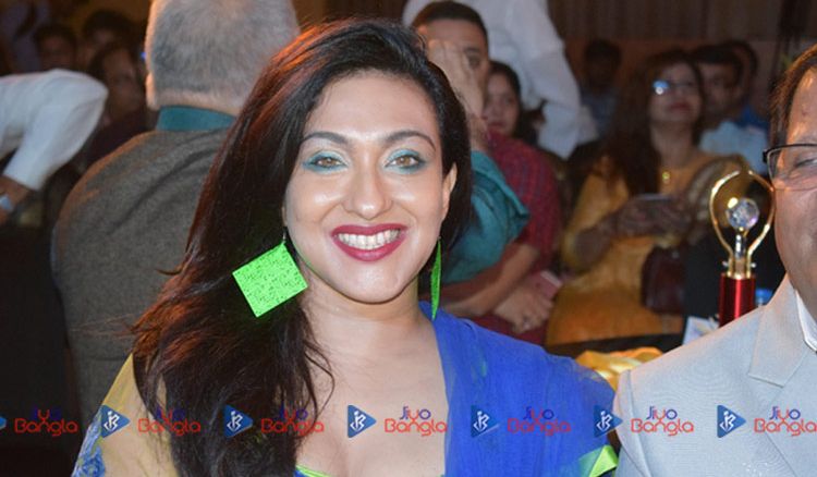 Why was Rituparna in Singapore?