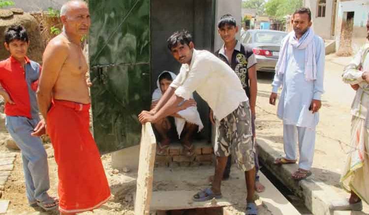 Villagers build toilets in three days